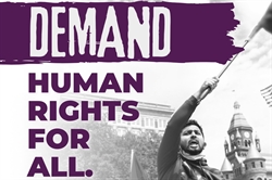 Man waving a flag with the text Demand Human Rights for All Man waving a flag with the text Demand Human Rights for All